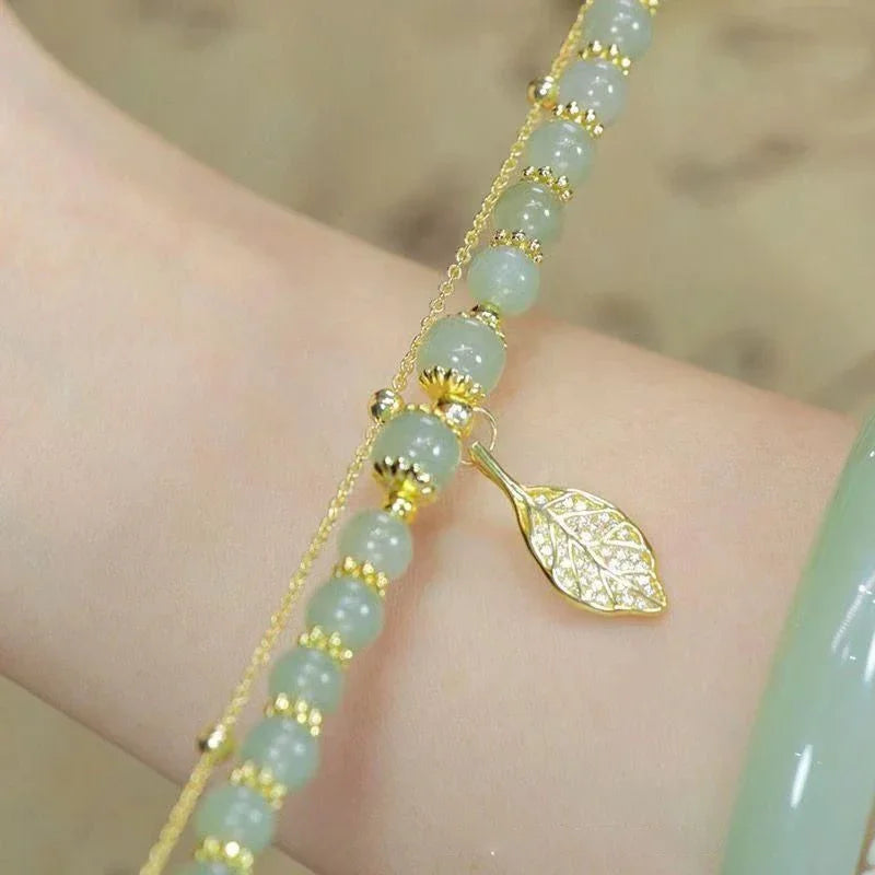 Nature’s Whisper Double Layer Bracelet - Green Beads & Gold Leaf